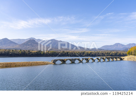 Taushubetsu River Bridge on the former Shihoro Line of the Japanese National Railways on a clear autumn day in Kamishihoro, Hokkaido 119425214