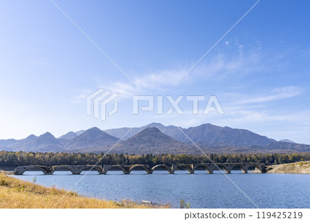 Taushubetsu River Bridge on the former Shihoro Line of the Japanese National Railways on a clear autumn day in Kamishihoro, Hokkaido 119425219