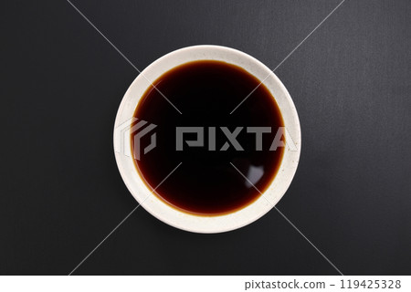 Soy sauce poured in dish Soy sauce poured in dish 119425328