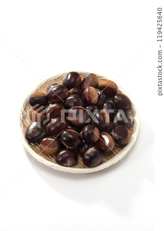 chestnuts in a colander 119425640