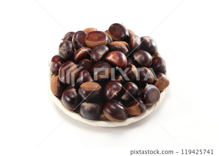 chestnuts in a colander 119425741