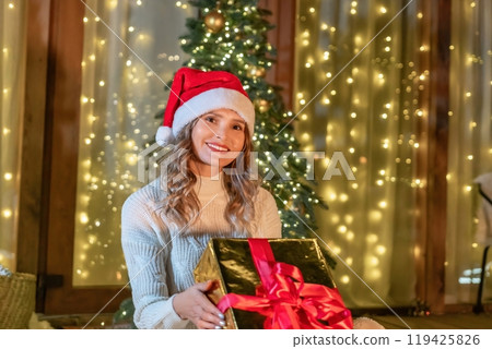 Woman Christmas Gift Present Smiling Woman Christmas Gift Present Smiling 119425826