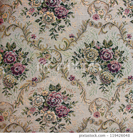 Beige fabric with floral pattern. Furniture jacquard fabric with flowers in geometric style. 119426048