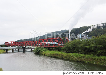 A Sanriku Railway train passing near Kamaishi Station A Sanriku Railway train passing near Kamaishi Station 119426957