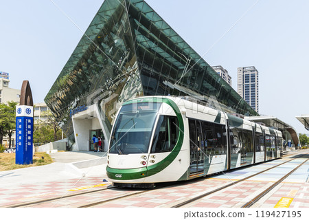 View of the circular light rail train driving past the TRA Museum of Fine Arts station in Kaohsiung, Taiwan. View of the circular light rail train driving past the TRA Museum of Fine Arts station in Kaohsiung, Taiwan. 119427195