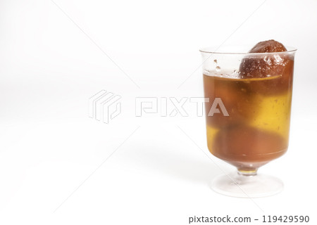 Gulab Jamun in sugar syrup in a transparent glass cup. Gulab Jamun in sugar syrup in a transparent glass cup. 119429590