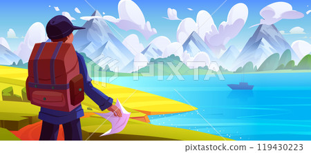 Male tourist with map looking at mountain lake 119430223