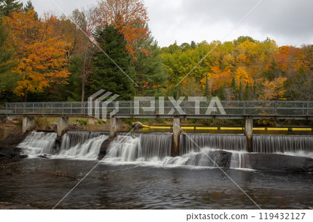 Bridge spanning river along hiking trail at Wilson Falls. 119432127