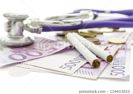 Cigarettes and stethoscope on Euro money Cigarettes and stethoscope on Euro money 119433833