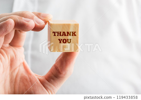 Close Up of Hand Holding Thank You Block Close Up of Hand Holding Thank You Block 119433858