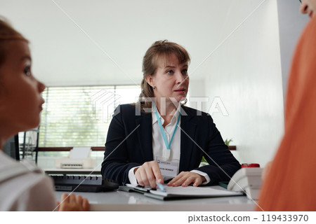 Social Worker Discussing Adoption With Woman Social Worker Discussing Adoption With Woman 119433970