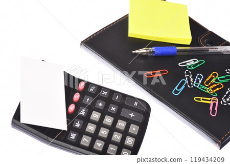 Calculator and stationery on white background: business and work concept 119434209