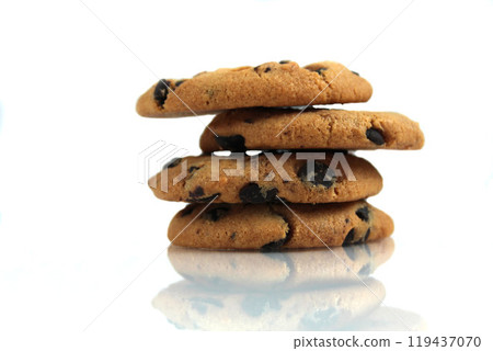 Chocolate Chip Cookies stacked on a white background with space for copyspace text. Chocolate Biscuit Isolate Chocolate Chip Cookies stacked on a white background with space for copyspace text. Chocolate Biscuit Isolate 119437070