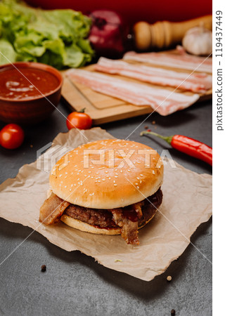 Juicy bacon burger with fresh ingredients, perfect for fast food lovers and gourmet enthusiasts 119437449
