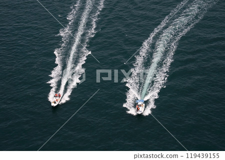 Fishing boats passing through the Kurushima Strait Fishing boats passing through the Kurushima Strait 119439155