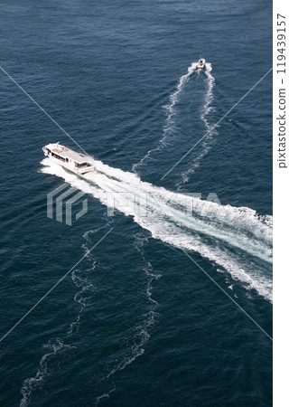 Tidal sightseeing boats passing through the Kurushima Strait Tidal sightseeing boats passing through the Kurushima Strait 119439157