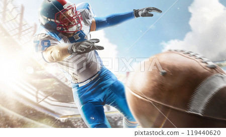 American football player catches the ball and flies in the air. Sports arena with fans. Bright sun. Sportsman in action. Isolated on white background American football player catches the ball and flies in the air. Sports arena with fans. Bright sun. Sportsman in action. Isolated on white background 119440620