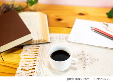 Coffee and books on the table Coffee and books on the table 119440779