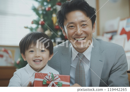 AI-generated image of a young Japanese father giving a Christmas present to his child 119442265