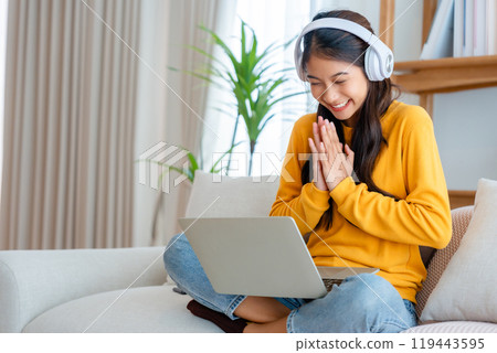 Young happy lucky woman student feeling excited winning 119443595