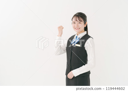 A woman in uniform doing a guts pose 119444602