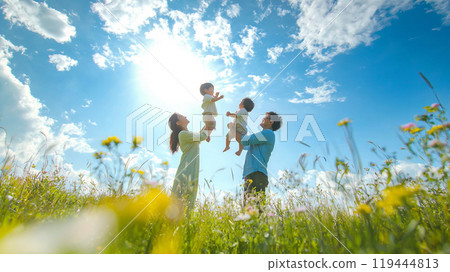 A moment of enjoying family bonding under the blue sky 119444813