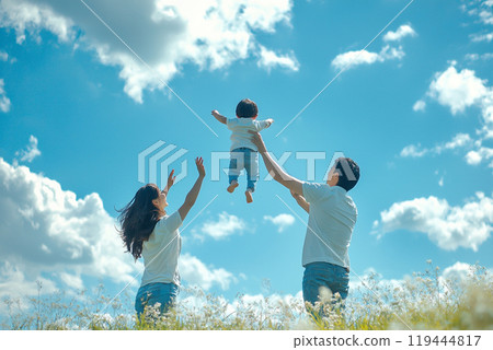 A moment of enjoying family bonding under the blue sky 119444817