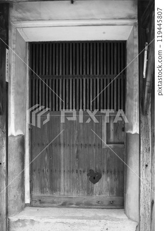 Entrance to an old storehouse (monochrome) Entrance to an old storehouse (monochrome) 119445807