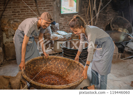 Artisans Collaboratively Engaged in a Traditional Workshop Utilizing Fresh Ingredients 119446060