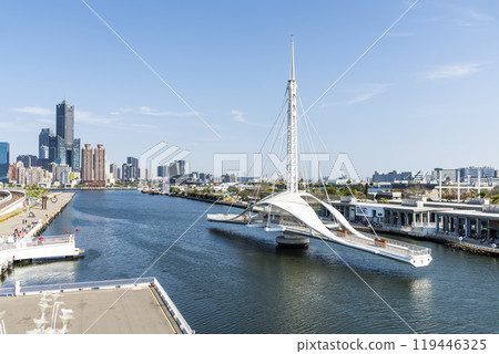 View of the Dagang Bridge (Great Harbor Bridge) rotating process in the port of Kaohsiung, Taiwan. View of the Dagang Bridge (Great Harbor Bridge) rotating process in the port of Kaohsiung, Taiwan. 119446325