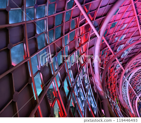 A stunning tunnel with vibrant purple and blue ceiling lights A stunning tunnel with vibrant purple and blue ceiling lights 119446493