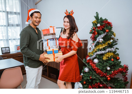 A Holiday Celebration Filled with Gifts, Joyful Decorations, and Cheerful Gatherings A Holiday Celebration Filled with Gifts, Joyful Decorations, and Cheerful Gatherings 119446715