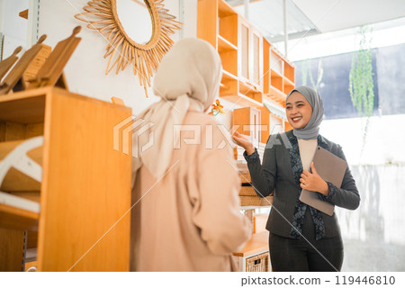 Professional Women Engaging in Meaningful Conversation at a Modern Workspace 119446810