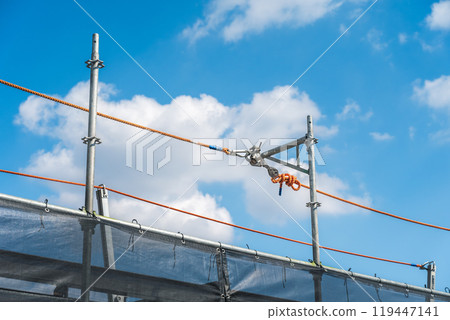 Blue sky and rope support pole 119447141