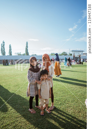 Joyful Moments: Kids Enjoying a Day Outdoors with Family in Beautiful Setting Joyful Moments: Kids Enjoying a Day Outdoors with Family in Beautiful Setting 119447188