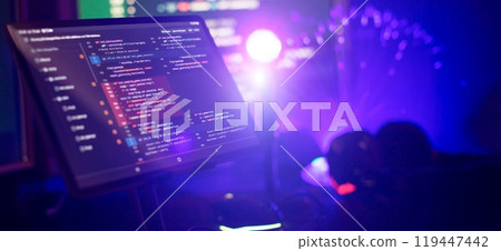 Working atmosphere of a programmer at home, background. Programming code abstract screen Working atmosphere of a programmer at home, background. Programming code abstract screen 119447442