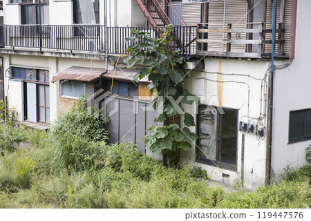 Abandoned apartment building 119447576