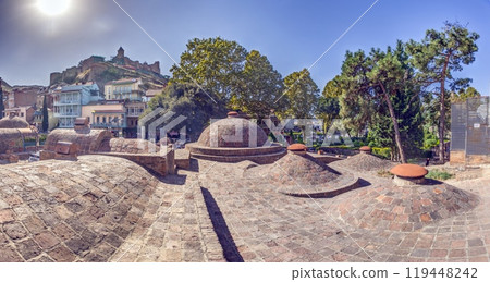 View of the sulfur baths in Tbilisi, Georgia, with historic domes and sunny weather 119448242