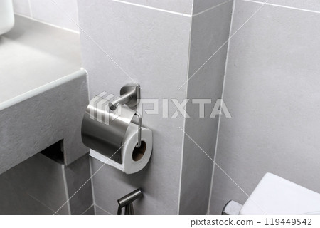 Stainless steel tissue holder in the bathroom 119449542