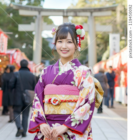 Japanese woman wearing kimono for New Year's visit to a shrine 1 119450092