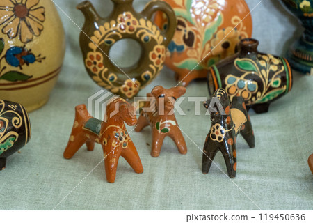 Clay whistle figurines in the shape of animals. 119450636