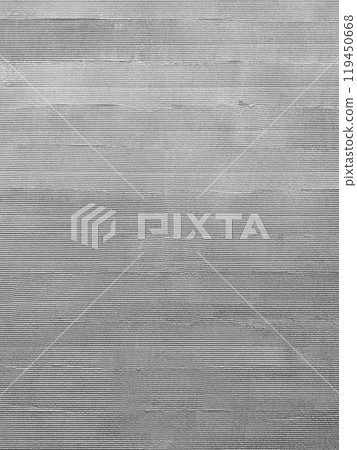 A vertical background image of a grey painted wall with a comb-brush finish 119450668