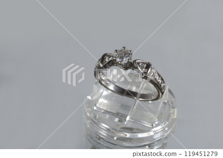 Solitaire Diamond Ring on a White Background Solitaire Diamond Ring on a White Background 119451279