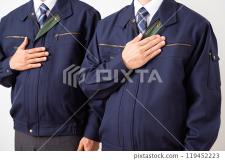 Middle-aged male businessman in work clothes Middle-aged male businessman in work clothes 119452223