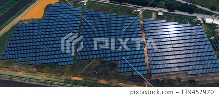 Ecology solar power station panels in the fields green energy . Aerial view of Solar panel, photovoltaic, alternative electricity source. Concept of sustainable resources. 119452970