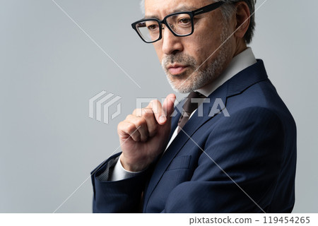 Businessman, gray hair, thinking, profile 119454265