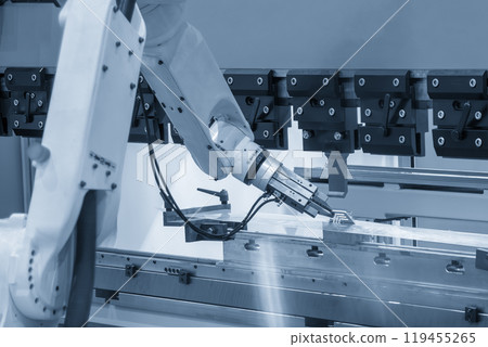 The high technology material handling at press brake bending machine by automatic robotic arm in the light blue scene. 119455265