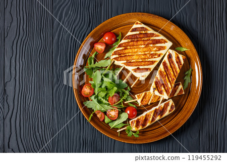Grilled Greek Halloumi Cheese on sticks, top view 119455292