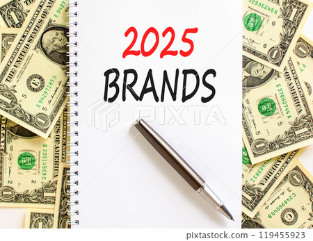 Planning 2025 brands new year symbol. Concept words 2025 Brands on beautiful white note. Beautiful background from dollar bills. Black pen. Business 2025 brands new year concept. Copy space. 119455923