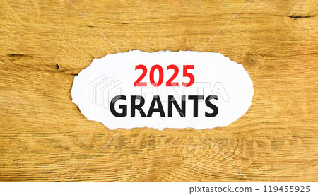 Planning 2025 grants new year symbol. Concept words 2025 Grants on beautiful white paper. Beautiful wooden background. Business 2025 grants new year concept. Copy space. Planning 2025 grants new year symbol. Concept words 2025 Grants on beautiful white paper. Beautiful wooden background. Business 2025 grants new year concept. Copy space. 119455925